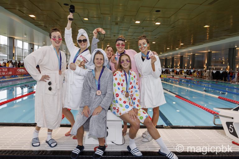 Female swimmers of team Uster Wallisellen of Switzerland wearing costumes pose for a photo during the Swiss Short Course Swimming Team Championships in Uster, Switzerland, Sunday, March 26, 2023. (Photo by Patrick B. Kraemer / MAGICPBK)