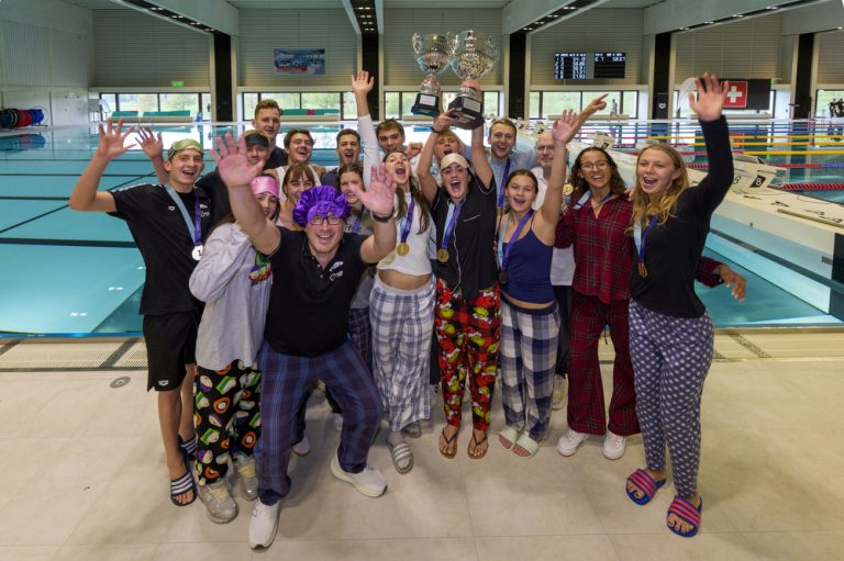 The men’s and women’s teams from Schwimmclub Uster and their coaches Paul (Pablo) KUTSCHER and Gabriel SCHNEIDER pose for a photo with their gold medals and the trophy after winning the Swiss Short Course Swimming Team Championships in Oberkirch, Switzerland, Sunday, April 19, 2026. (Photo by Patrick B. Kraemer / MAGICPBK)